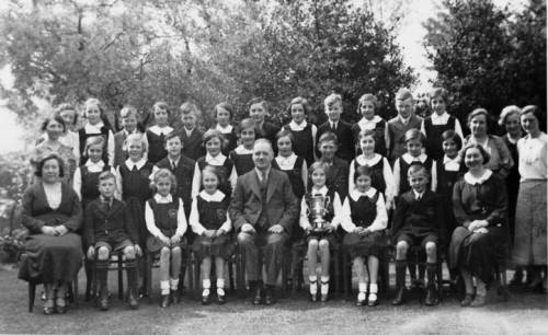 Whitfield School, Capt. Furniss with school choir contest winners