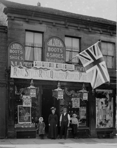 57 High Street West decorated for the Coronation in 1902